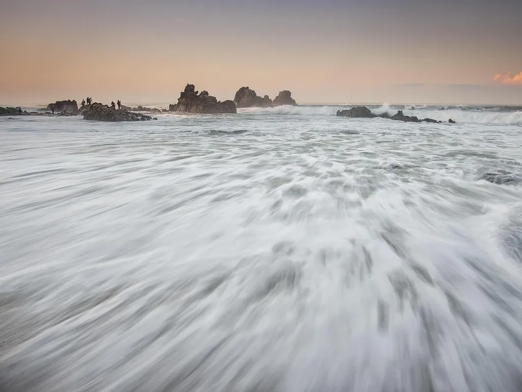 Amazing sunset with big waves on Dream Beach