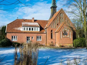 The Chapel with the scarecrows in a field above the villageLacnov