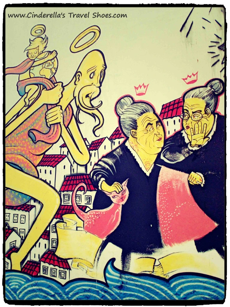 Painted Fado on the wall in the street of Lisbon
