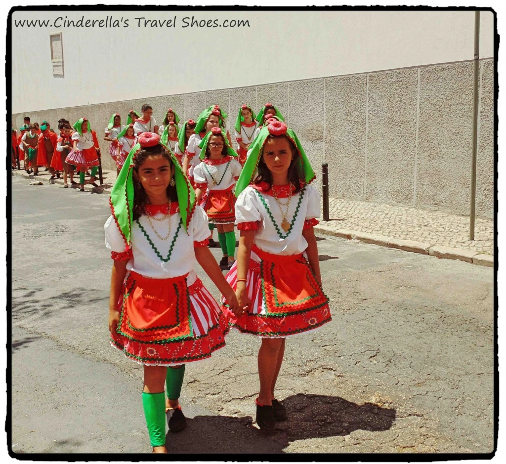 Portuguese girls in typical costume during the Festival of Sardines