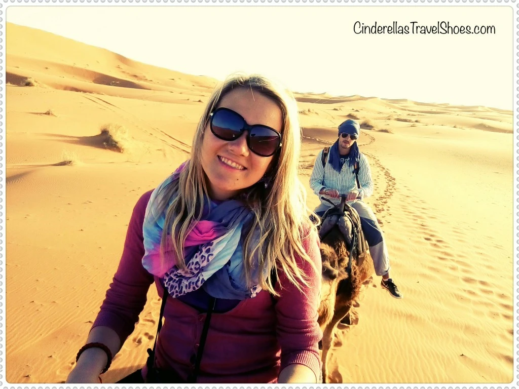 Riding Camels after sunrise in Sahara Desert