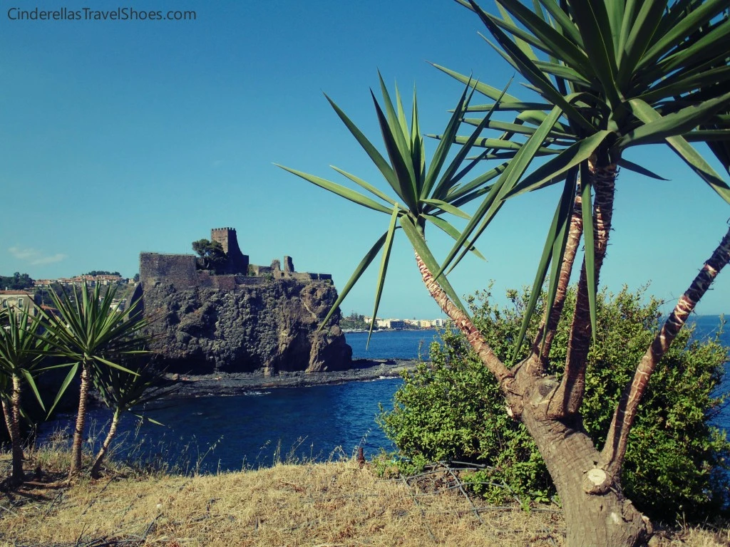 Castle with rocky coast in Aci Castello