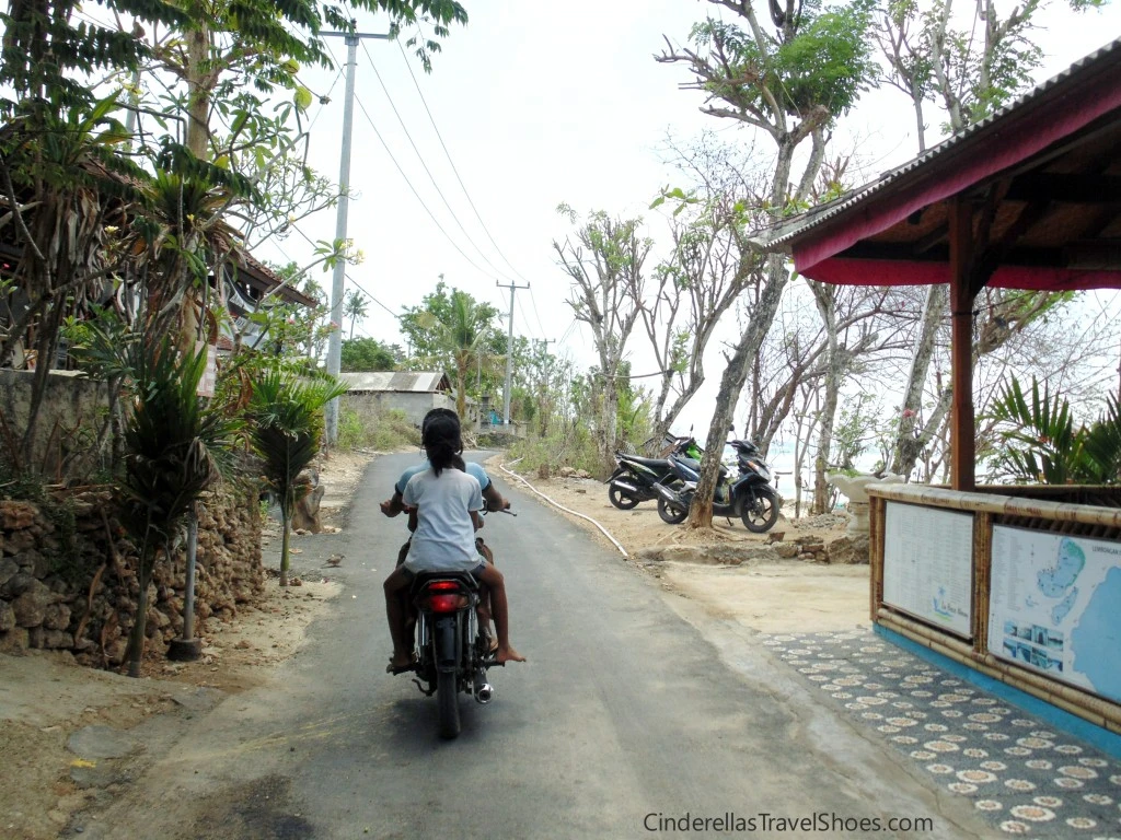Chidren drive the motobike in Indonesia