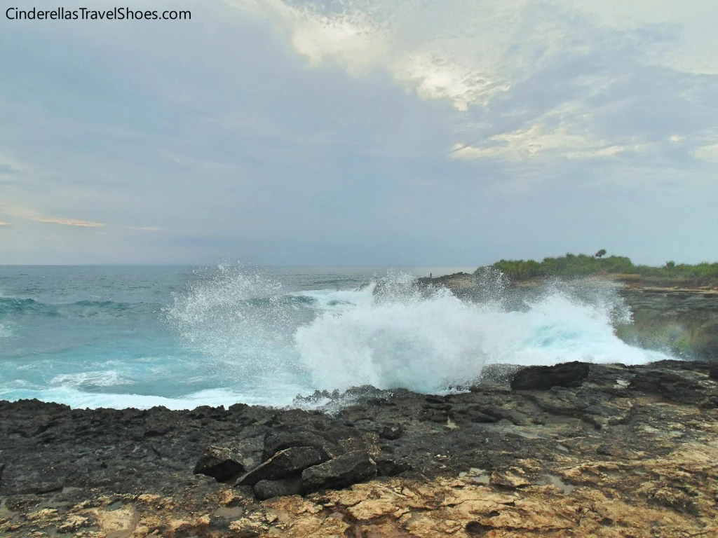 Waves hit rocks in Lembongan
